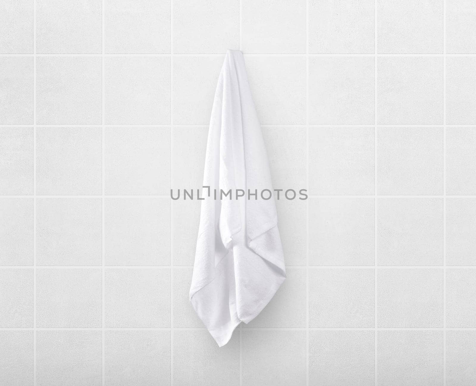 white towels on hanger in toilet bathroom