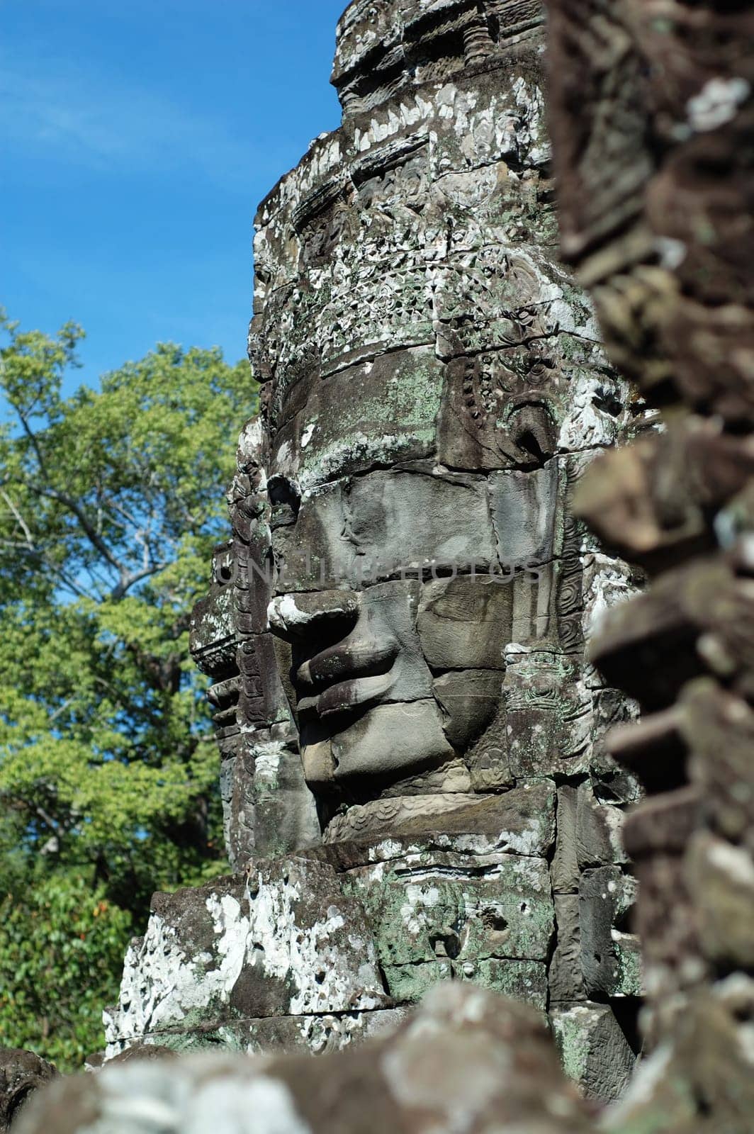 An ancient face of temple in angkor thom