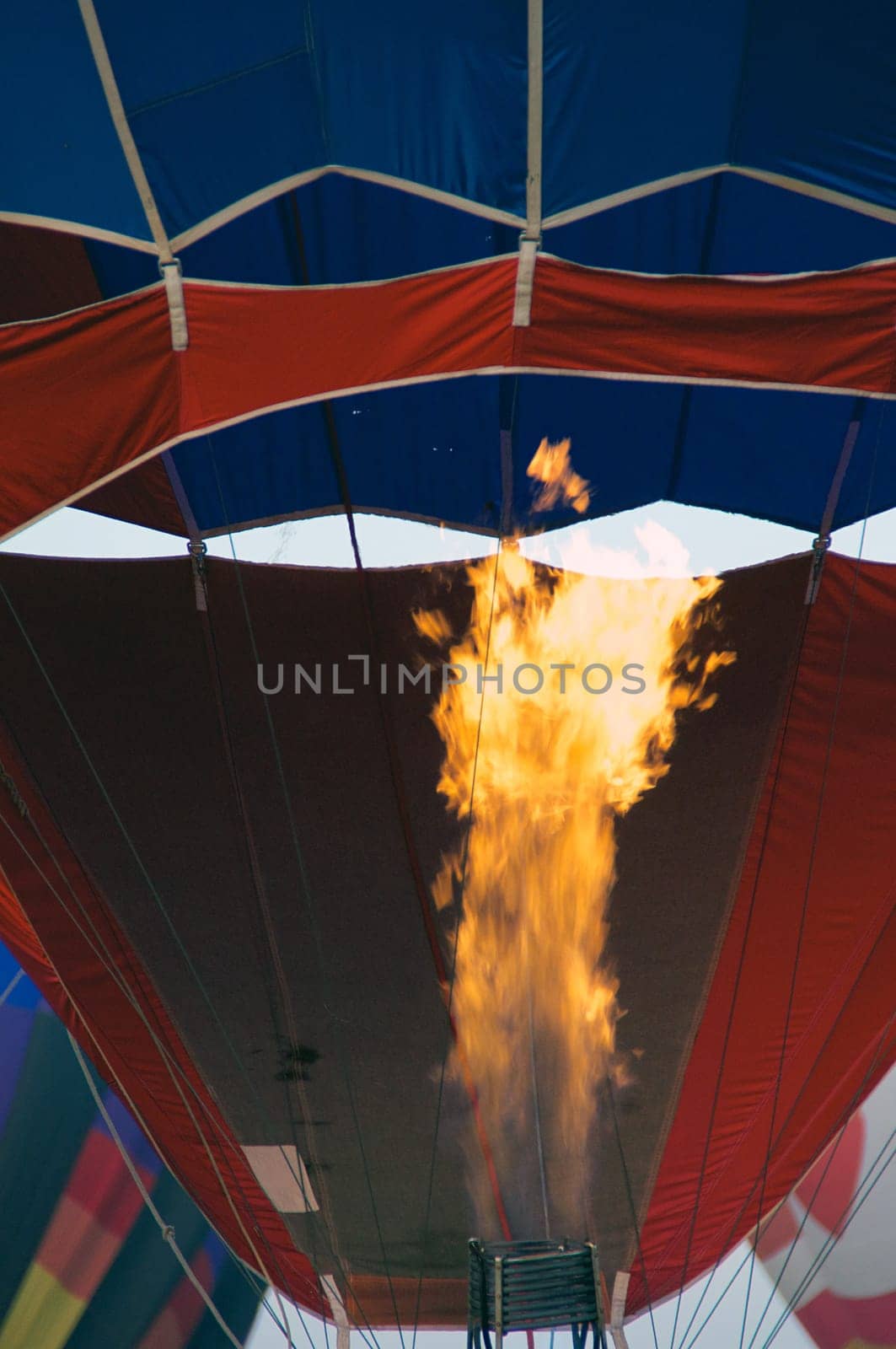 Showing the top of the furnace and the flame that provides hot air to fill the balloon.