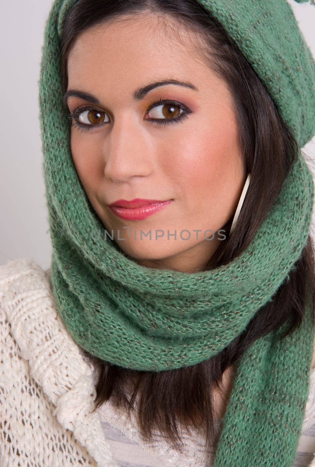 A beautiful woman wrapped in knitted material