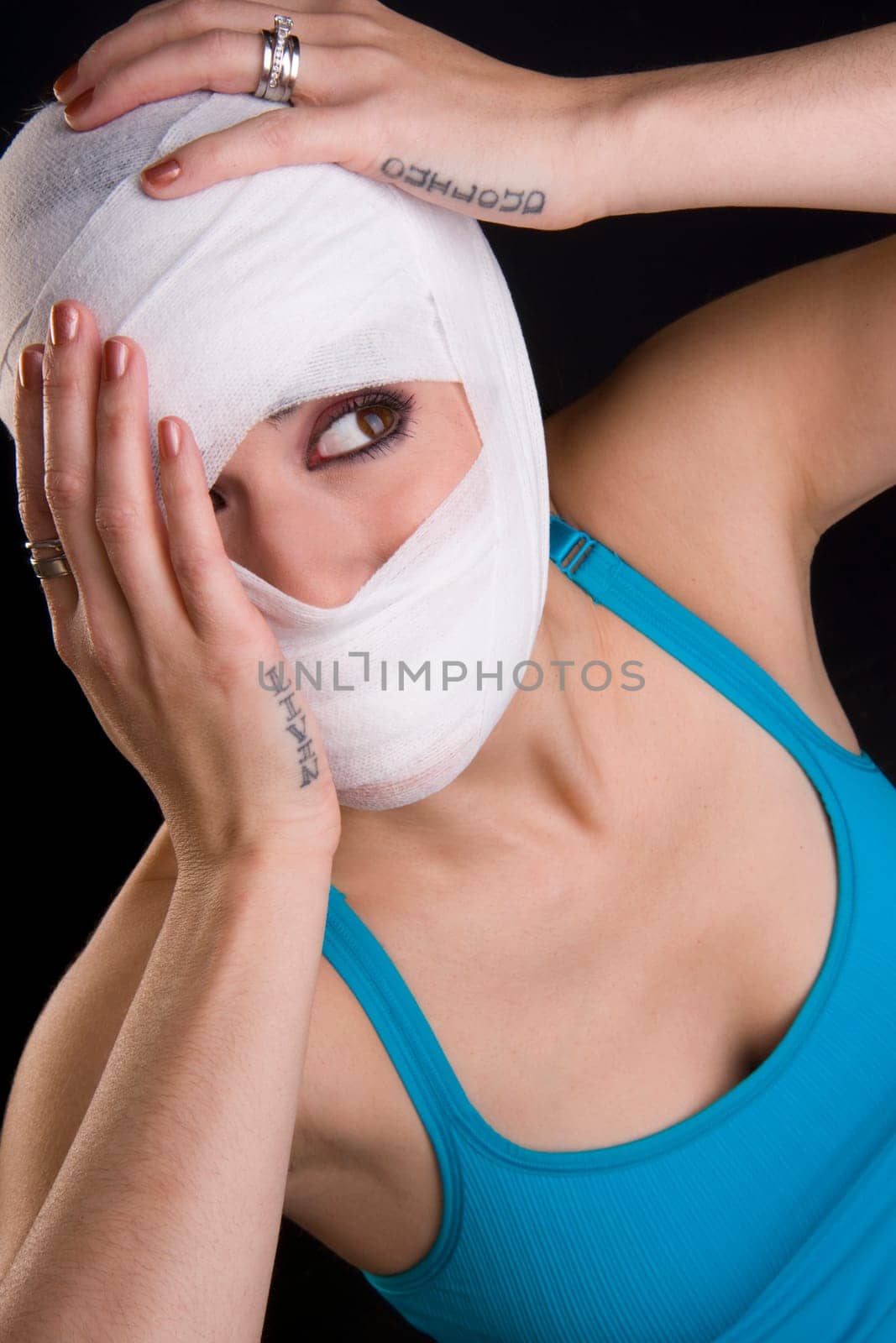 Woman in pain eyes closed holding head