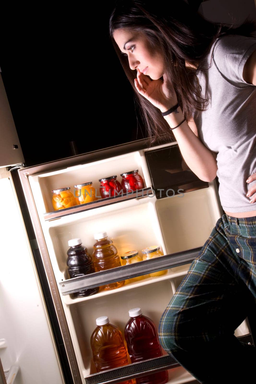 She gets Into the Fridge late night snack food raid