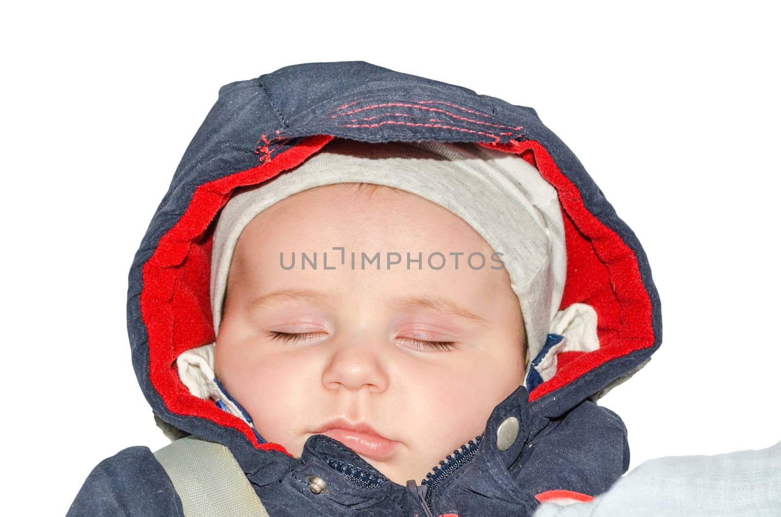 Baby lies m stroller. Has just woken up. Exempted.