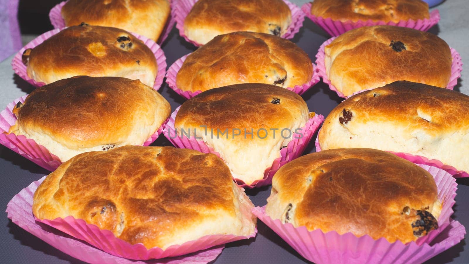 Homemade buns with raisins. baked pies