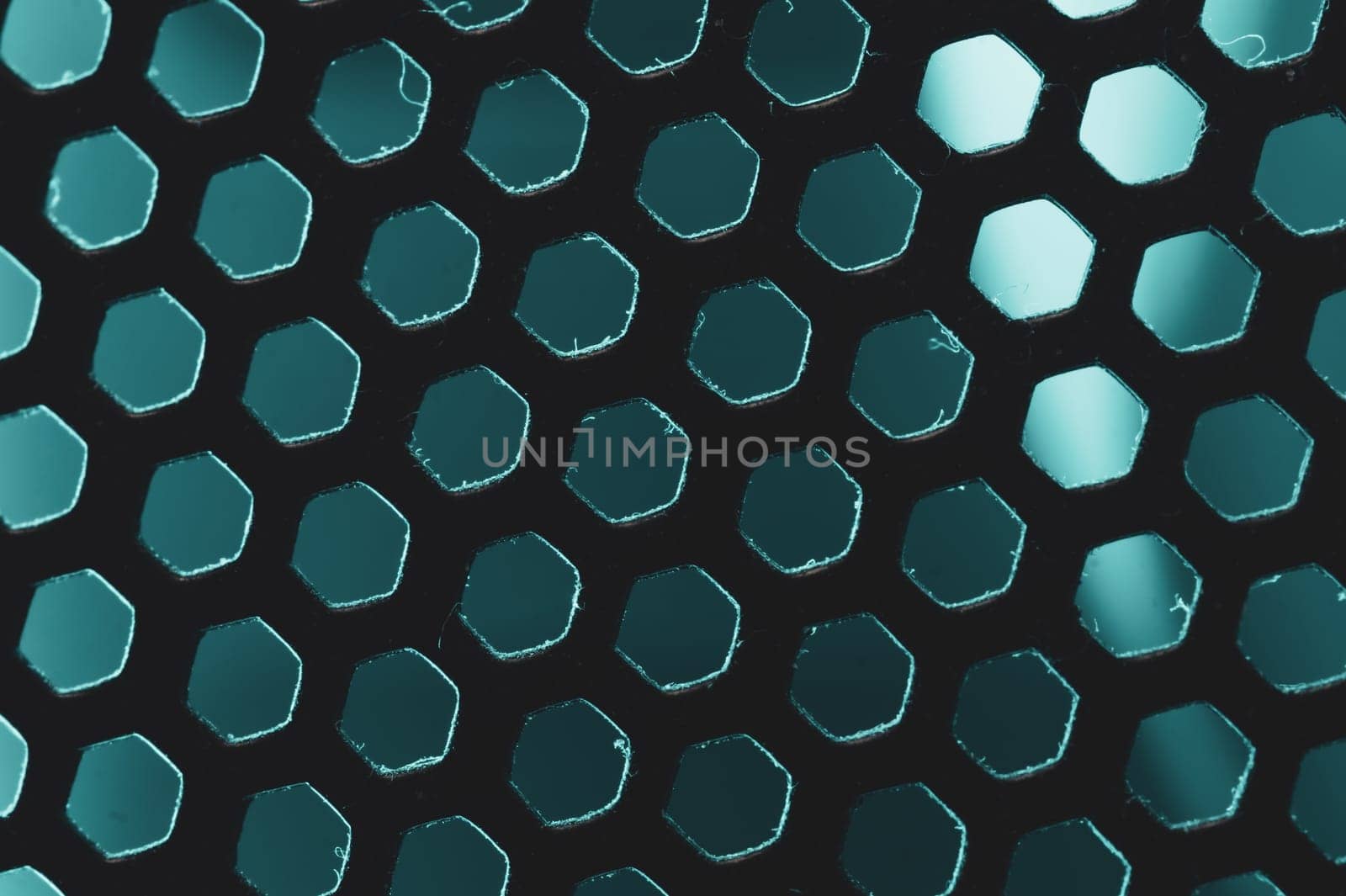 Grid with ventilation holes of computer air cooling system. abstract background