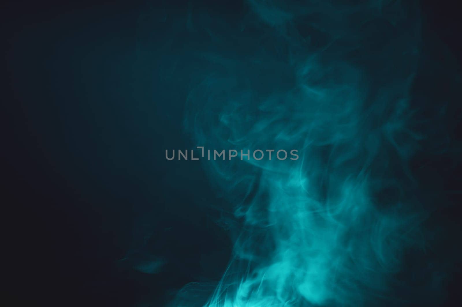 Smoke clouds in the dark abstract background. fog floating in air