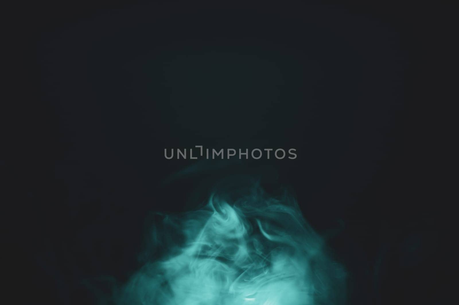 Smoke clouds in the dark abstract background. fog floating in air