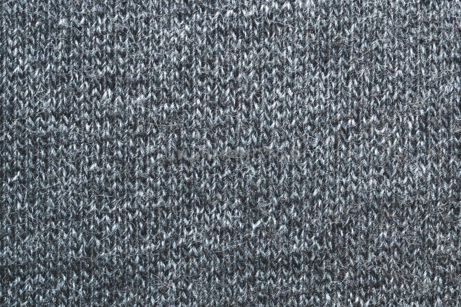 Gray knitted texture. fabric close up. textile background