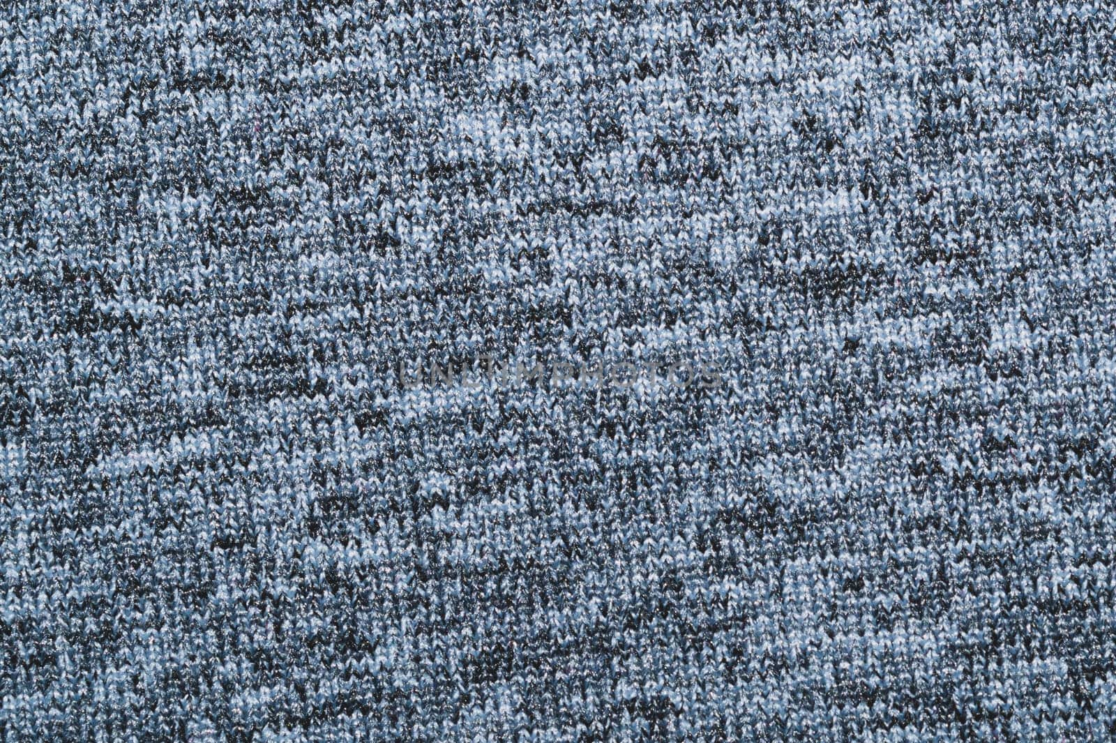 Gray knitted texture. fabric close up. textile background