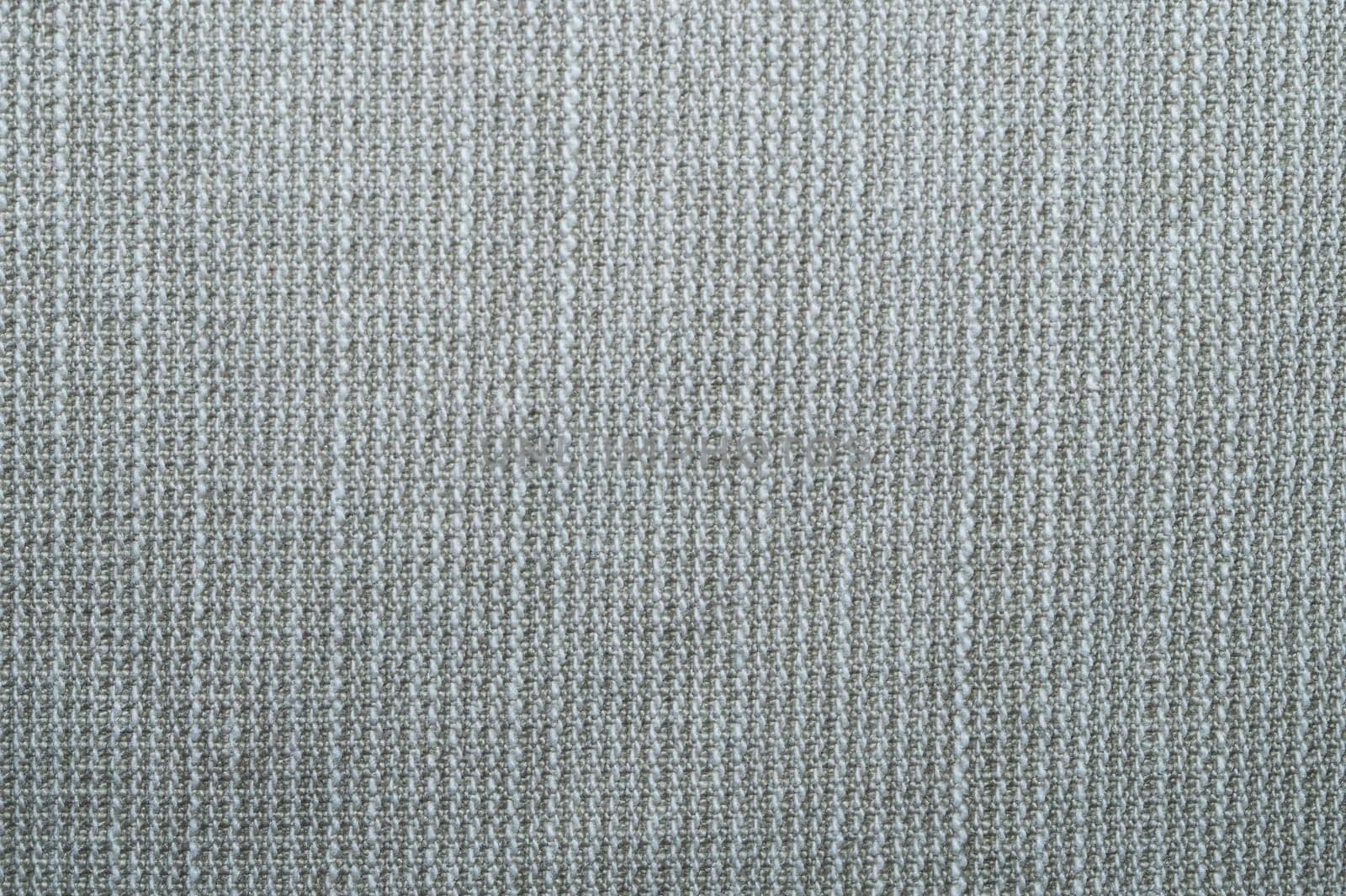 Beige knitted background. fabric texture. textile close up