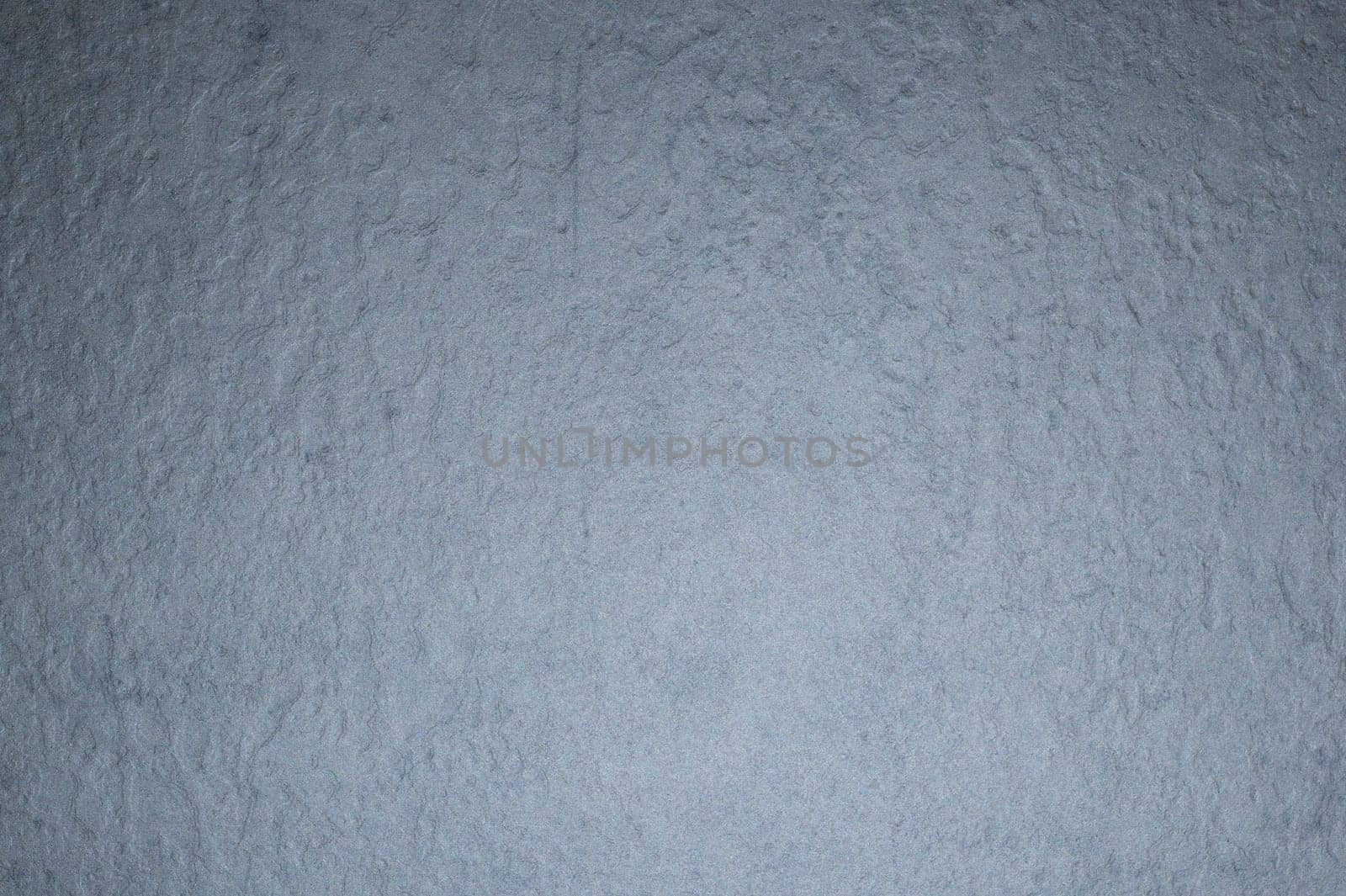 Rough wall background. uneven gray surface backdrop