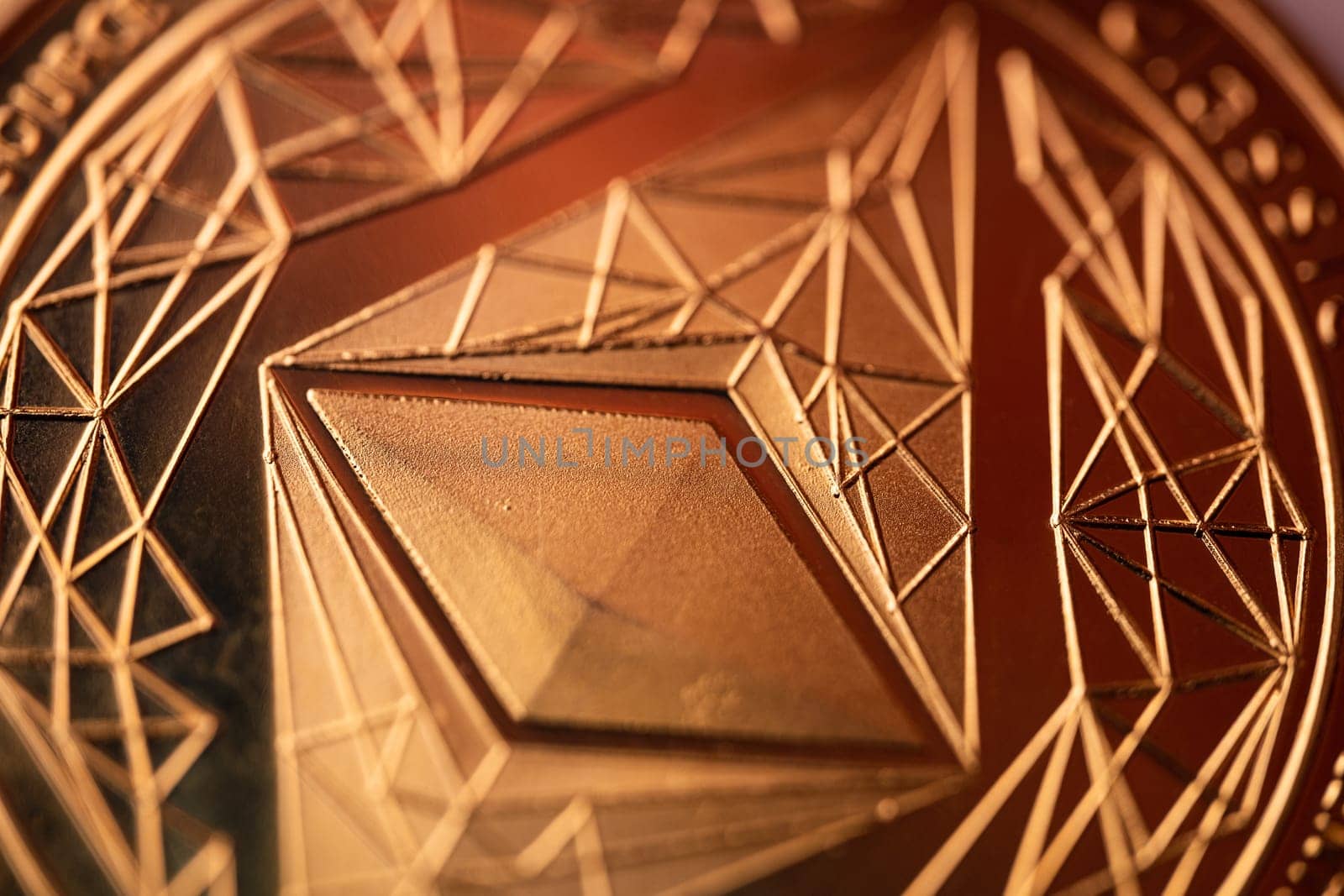 top view extreme macro closeup of crypto ethereum golden coin geometric symbol logo