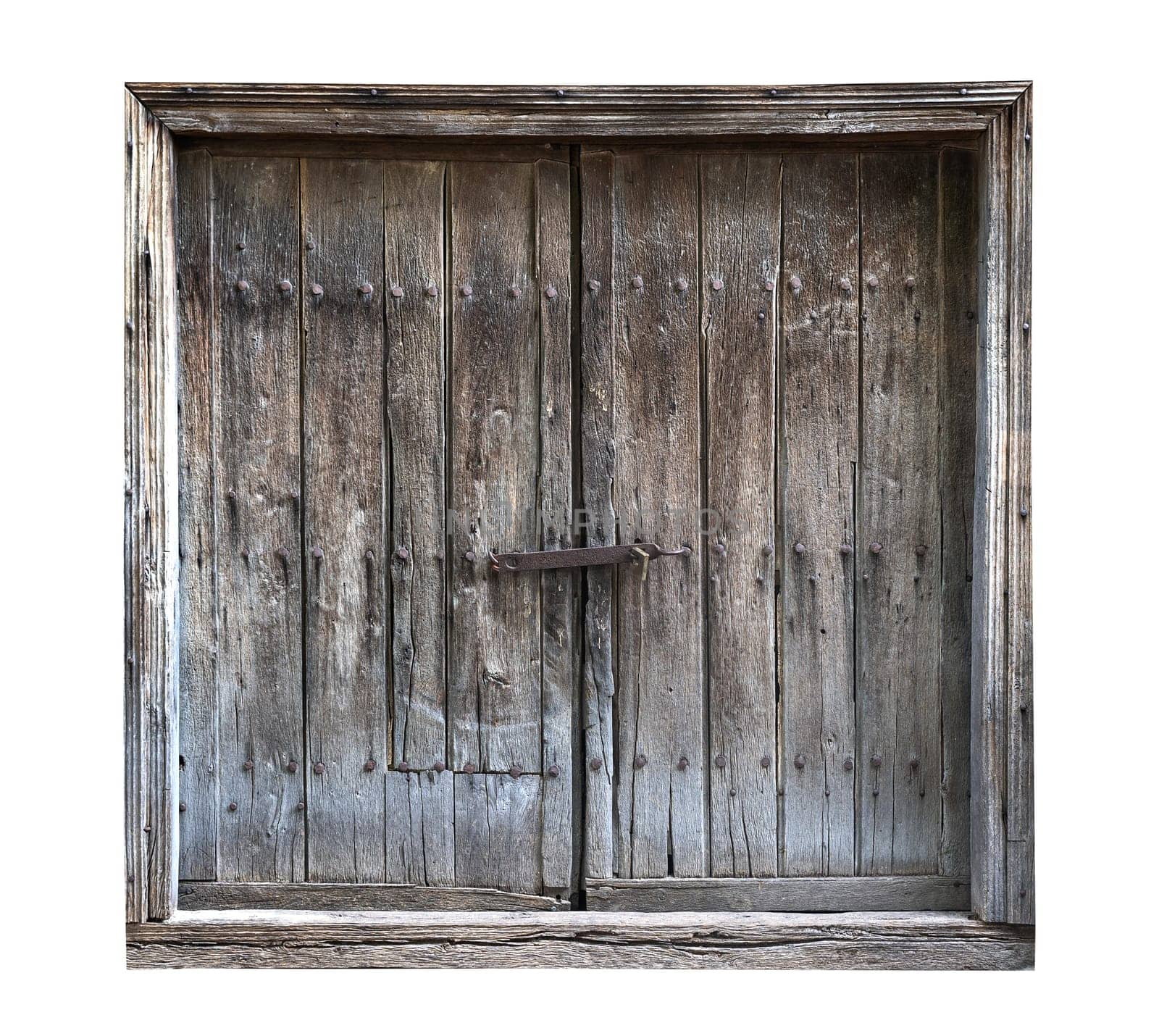 front view closeup of vintage wooden barn door with weathered wood dark texture and metallic lock and bolts isolated on white background