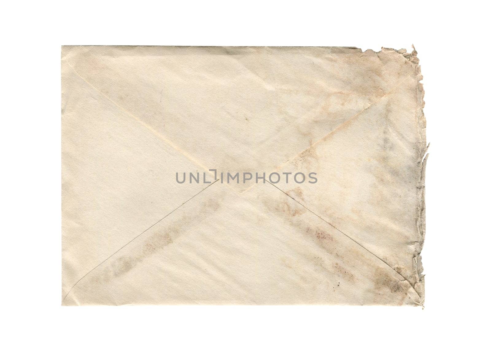 front view closeup of blank old aged vintage closed letter paper postage envelope with torn edges and wrinkled grunge texture isolated on white background
