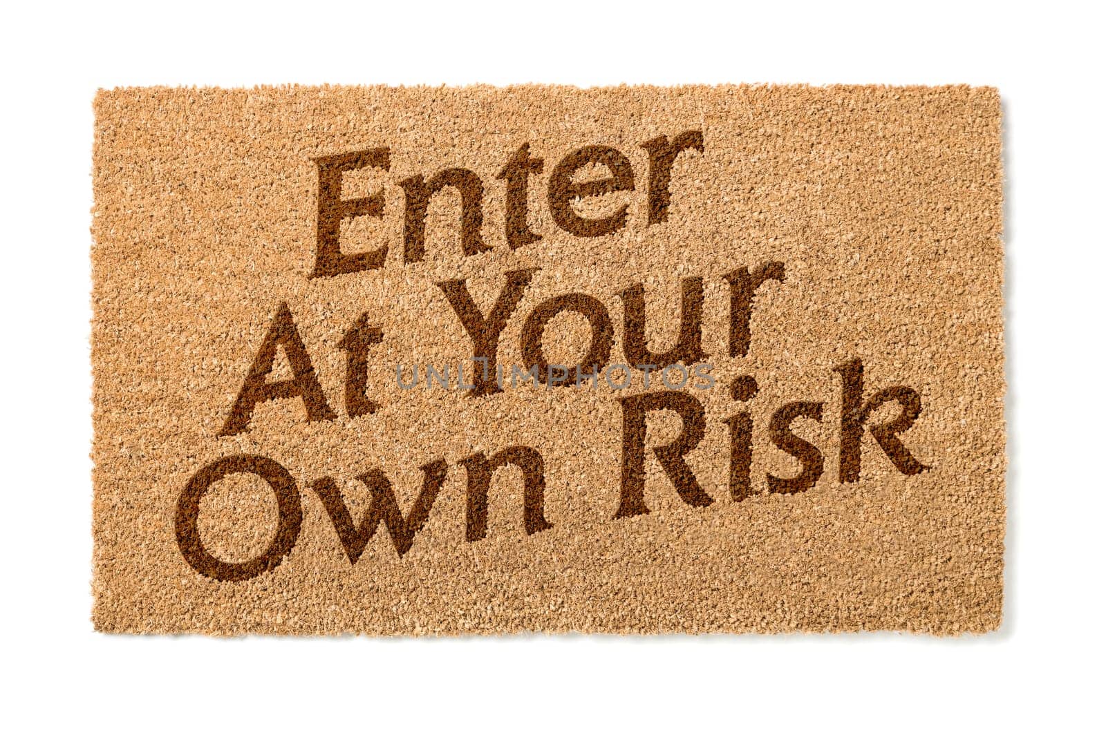 Enter At Your Own Risk Welcome Mat Isolated On A White Background.