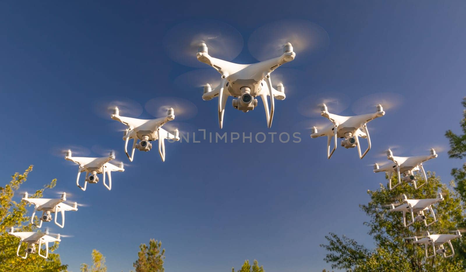 Formation of Drones Swarm in the Blue Sky.