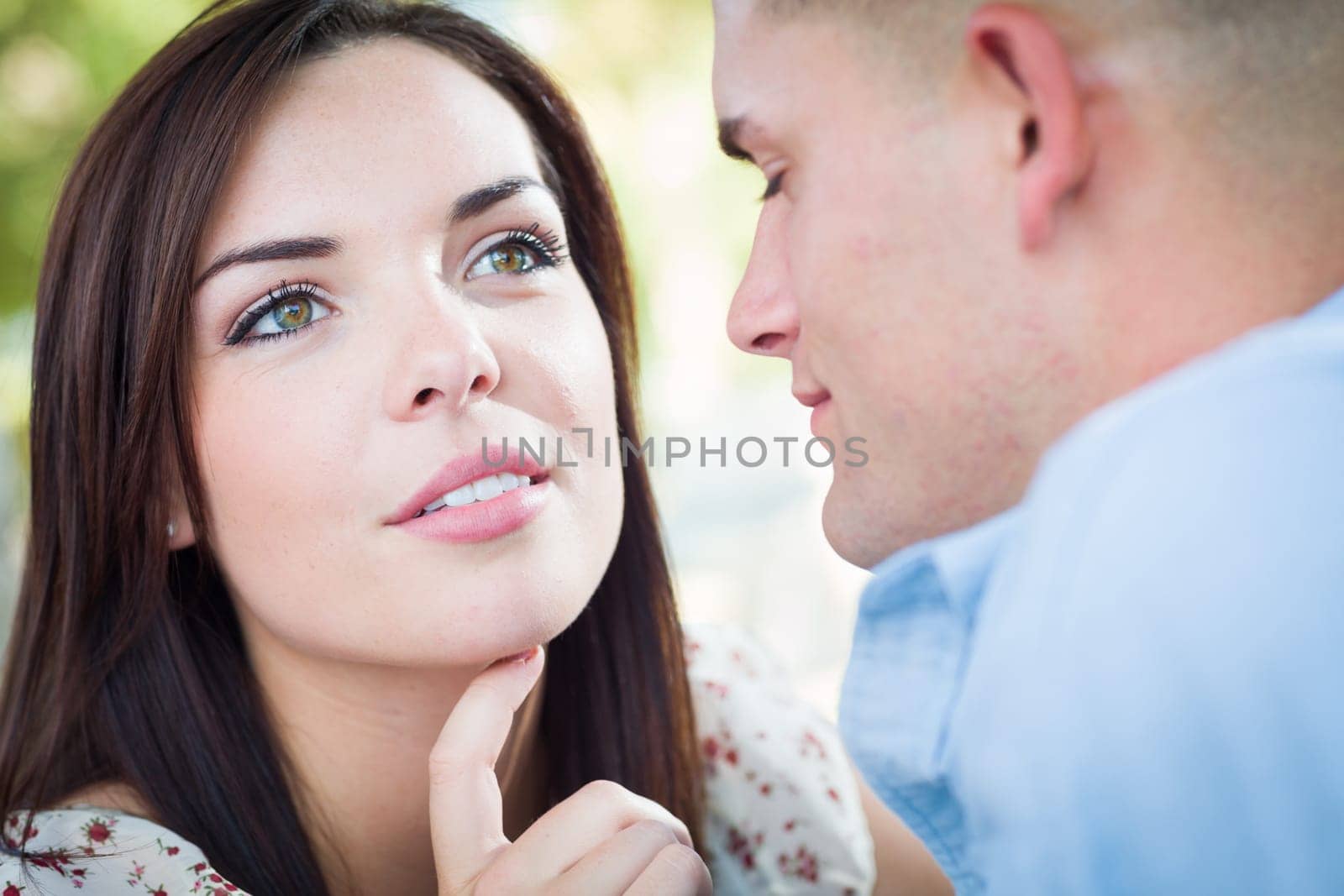 Happy Romantic Caucasian Couple Portrait in the Park.