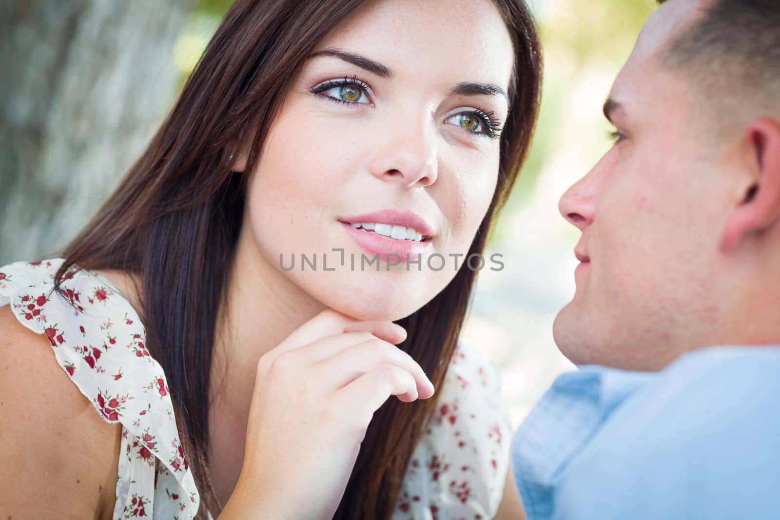 Happy Romantic Caucasian Couple Portrait in the Park.