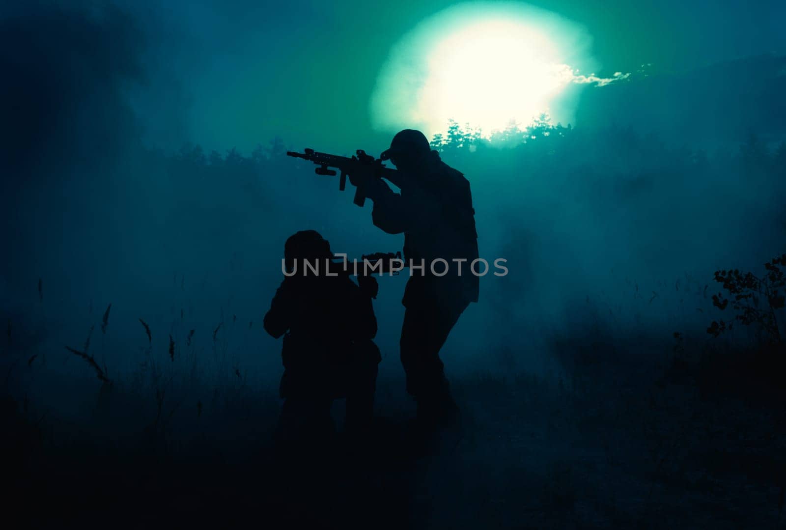 United States Marines in action. Military battle, forest battlefield, smoke grenades