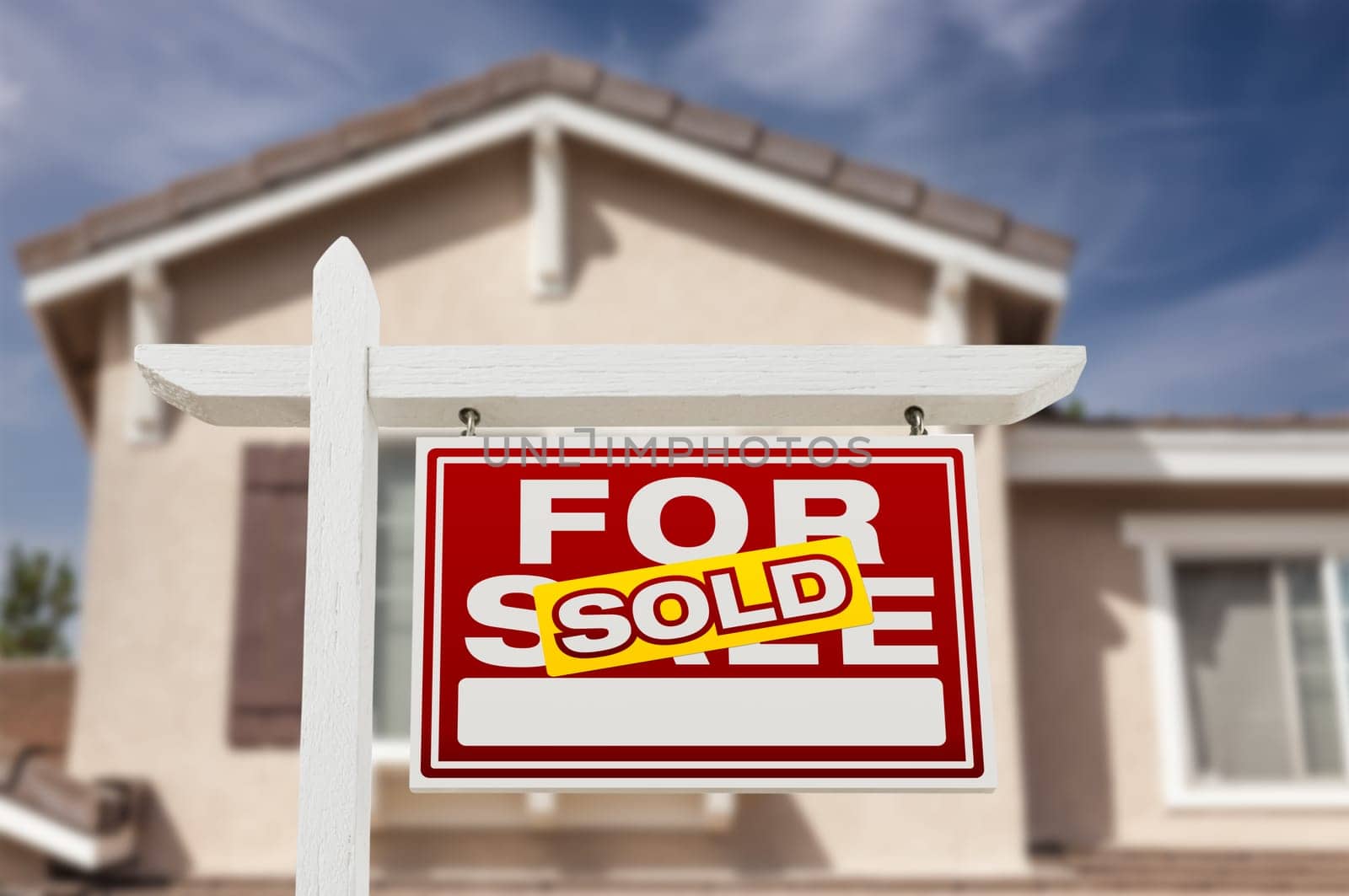 Sold Home For Sale Real Estate Sign and House