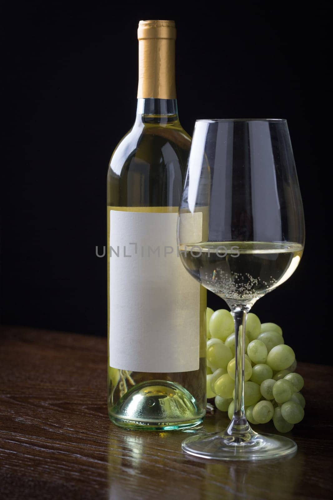 Wine Glass and Bottle with Blank Label Ready For Graphic and Text.