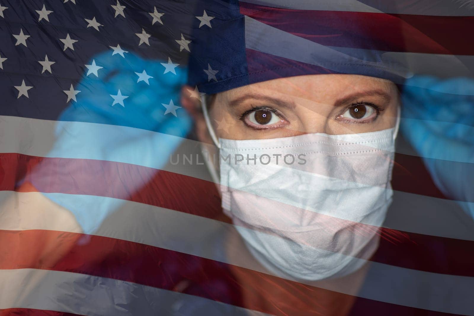Doctor or Nurse Wearing Medical Face Mask and Scrubs with Ghosted American Flag.