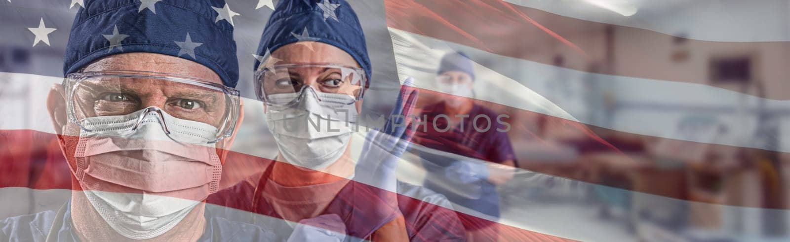 Doctors or Nurses Wearing Medical Personal Protective Equipment (PPE) Within Hospital Against Ghosted American Flag Banner.