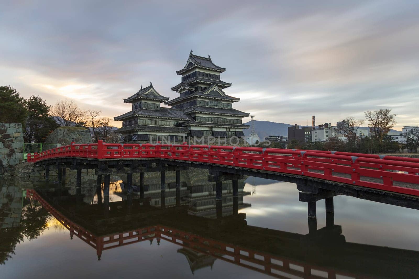 This photo was shot from Matsumoto Castle, Japan in early morning. The soft sunlight touch the castle is so beautiful.