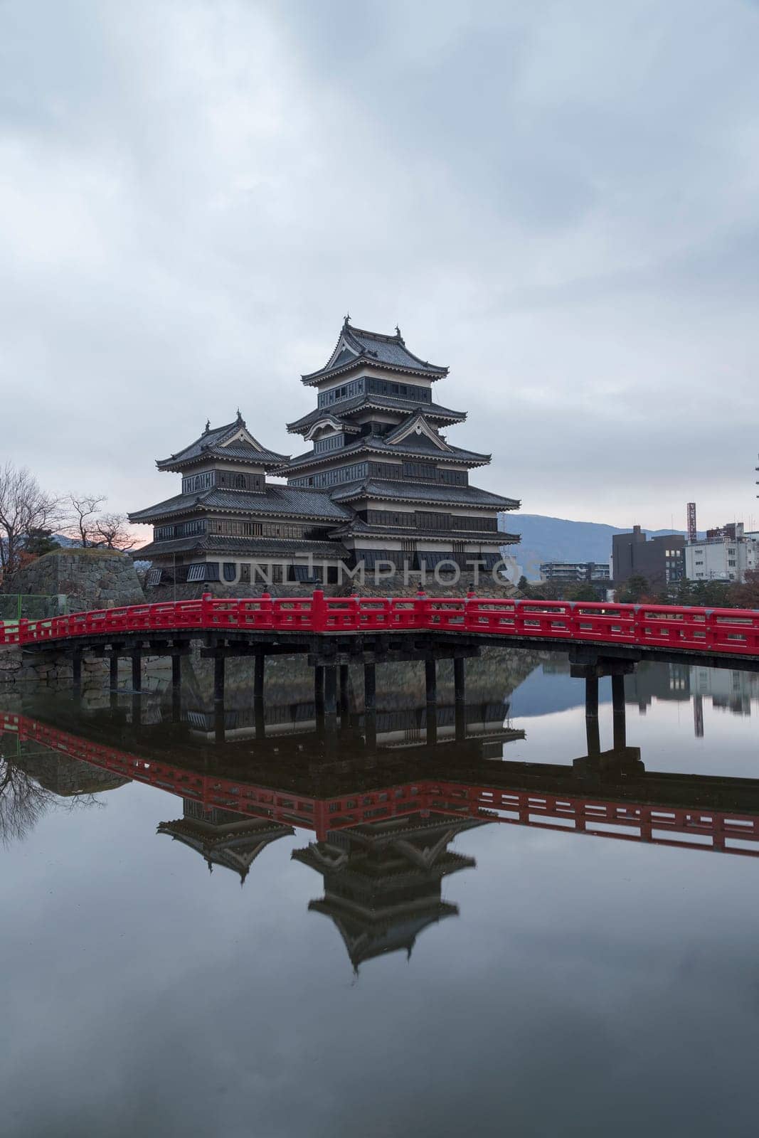 This photo was shot from Matsumoto Castle, Japan in early morning. The soft sunlight touch the castle is so beautiful.