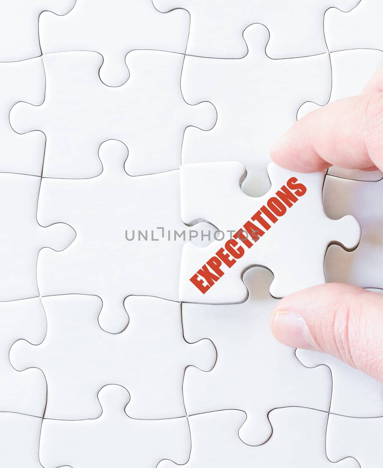 Last puzzle piece with word  EXPECTATIONS. Concept image