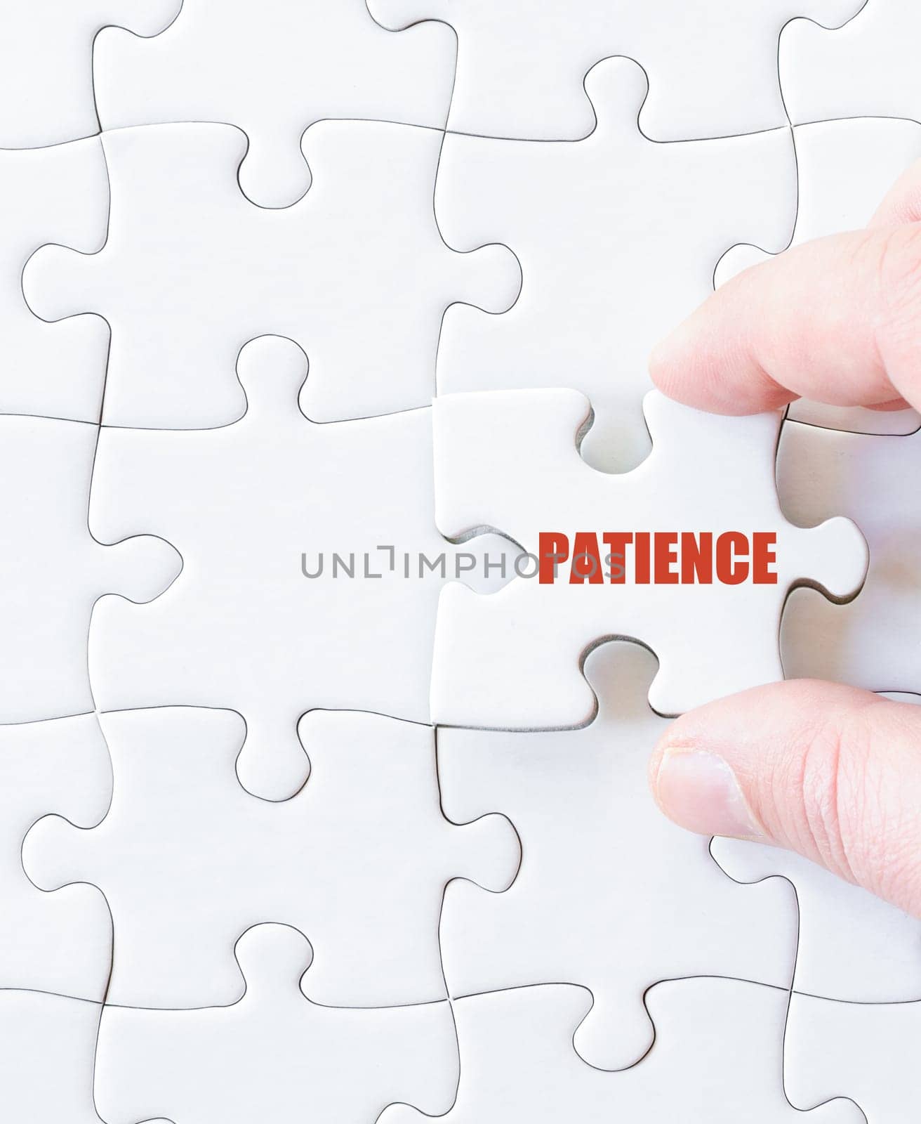 Last puzzle piece with word PATIENCE. Concept image