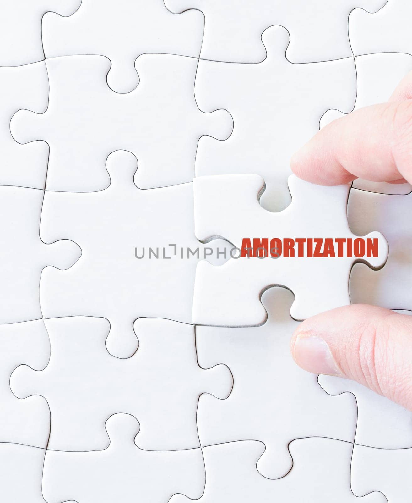 Last puzzle piece with word  AMORTIZATION. Concept image