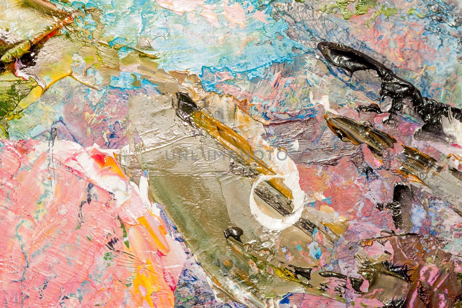 artist's palette with oil paints can be used as background