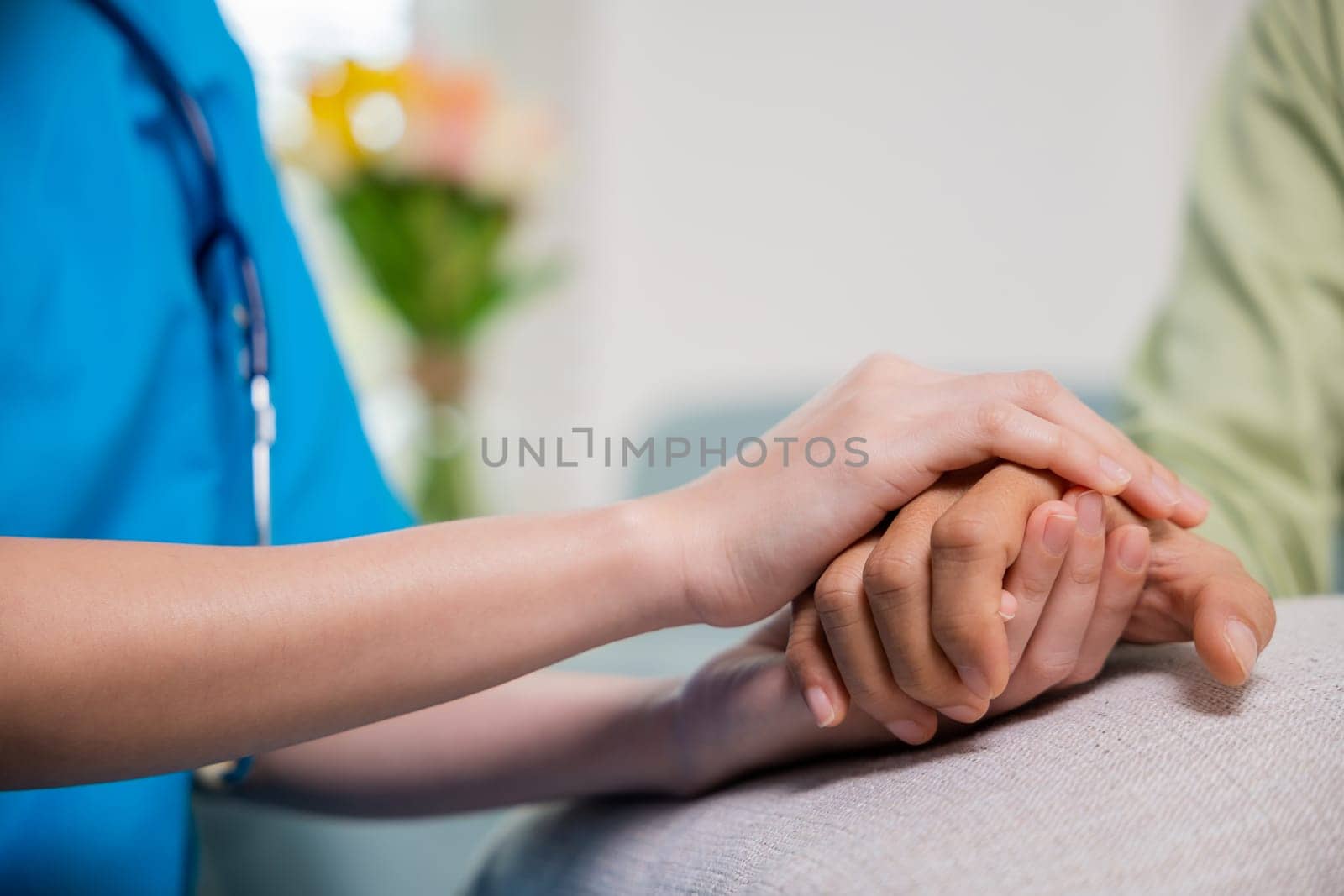 Closeup hand. Young woman helping hold hands offering her senior man, Caring nurse helping elderly old man care gets help from hospital, medical health care, International Day for the Elderly concept