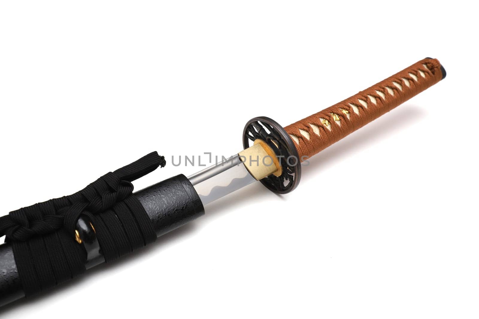 Japanese sword steel fitting and brown cord with black scabbard isolated in white background.