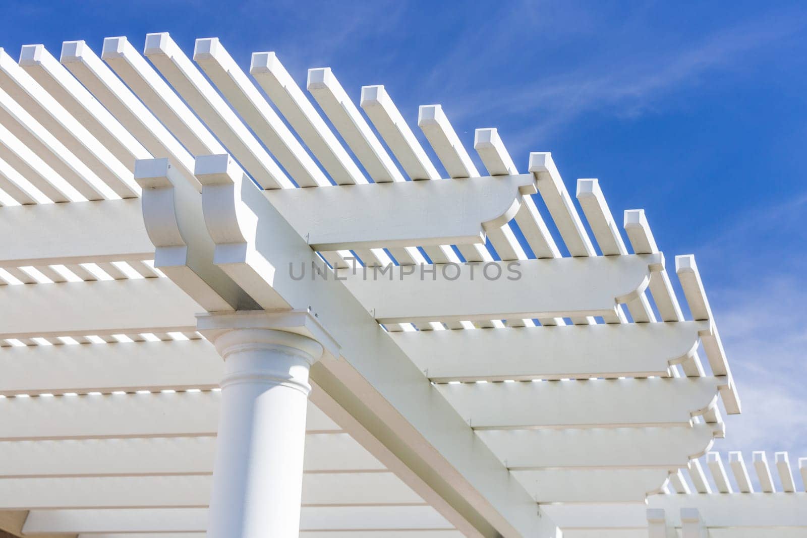 Beautiful House Patio Cover Against the Blue Sky.