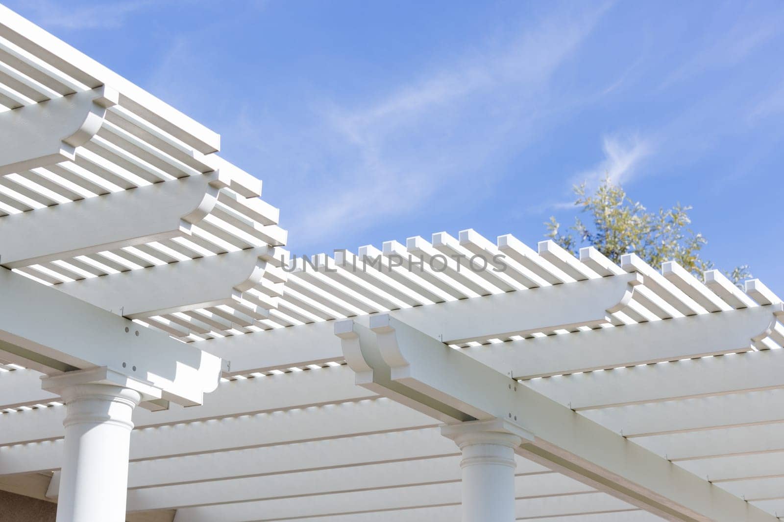 Beautiful House Patio Cover Against the Blue Sky.