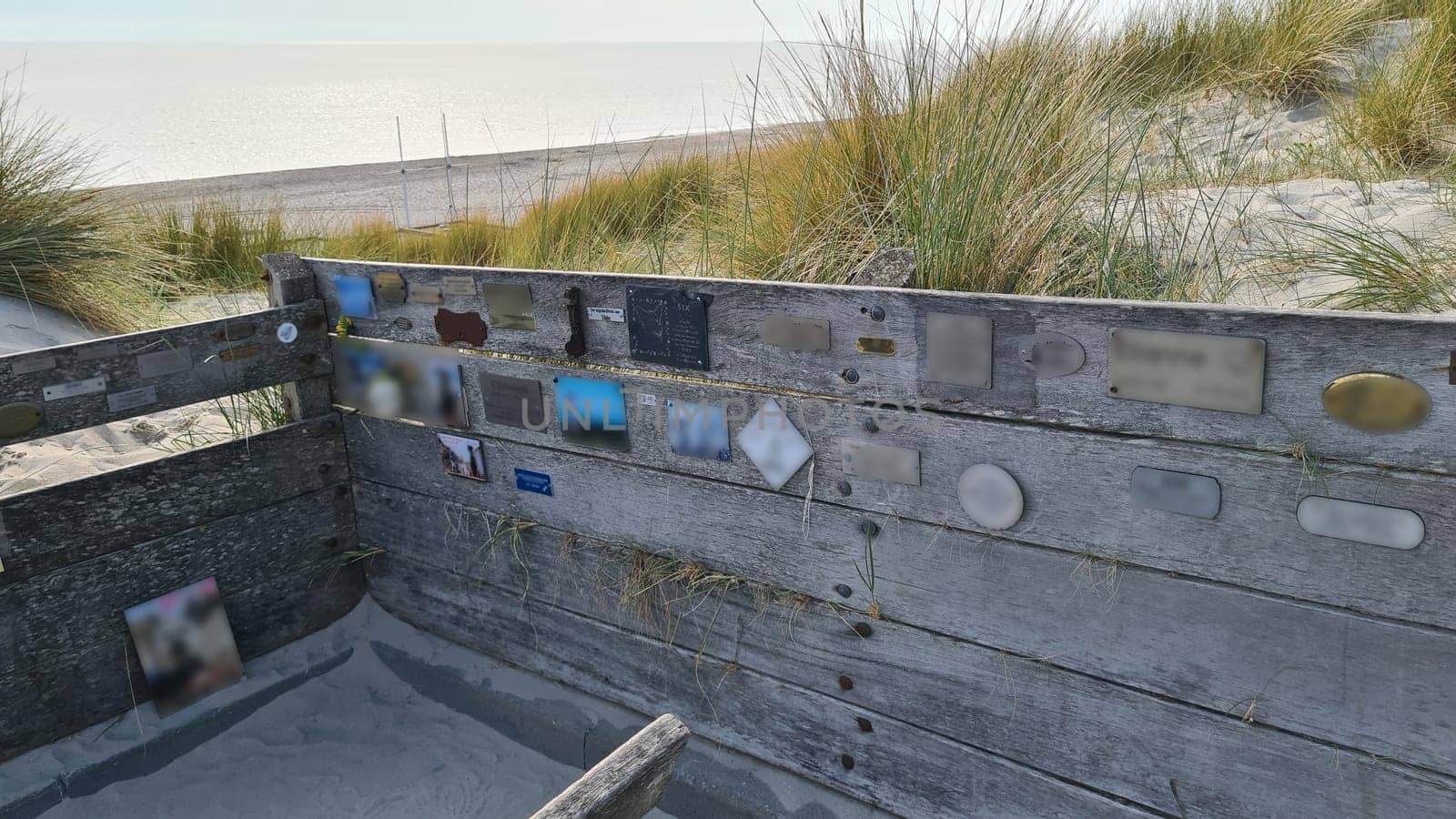 View over the sea from the dune over North Sea and canal in Ouddorp, Zeeland province, The Netherlands. Outdoor scene of coast in Europe nature.