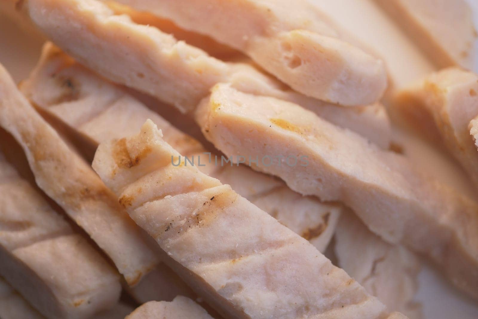 Freshly cut tofu cubes ready for cooking in a healthy dish.