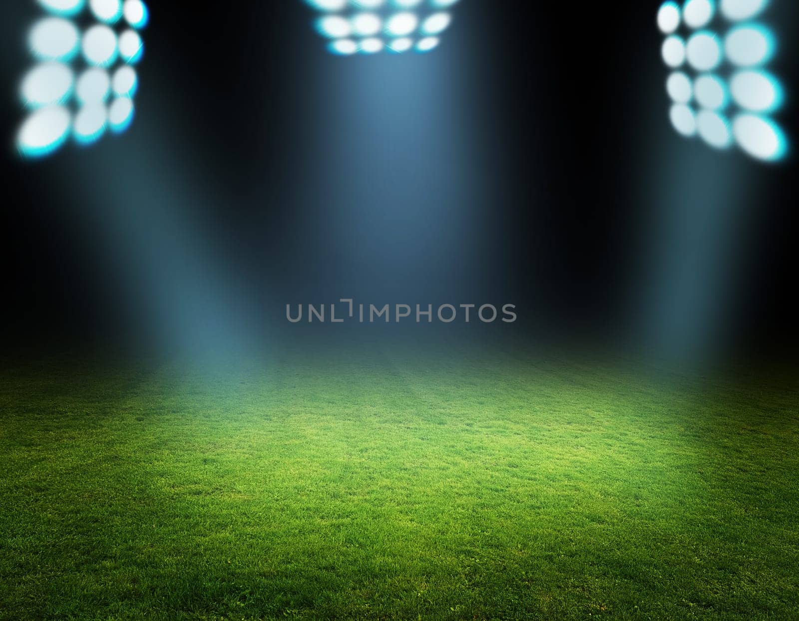 green soccer field and bright lights