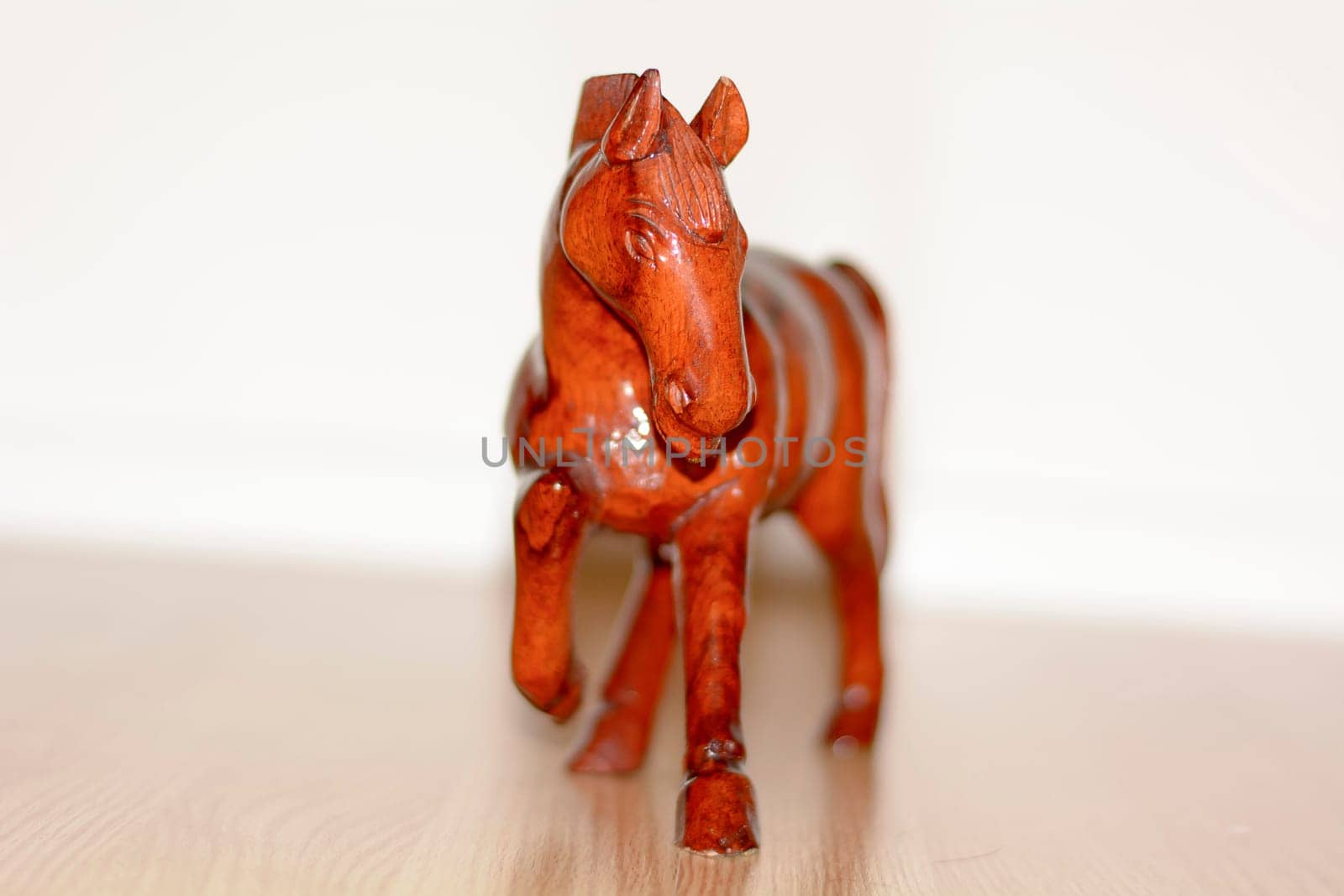 This picture is the wooden horse. It is a carving horse.