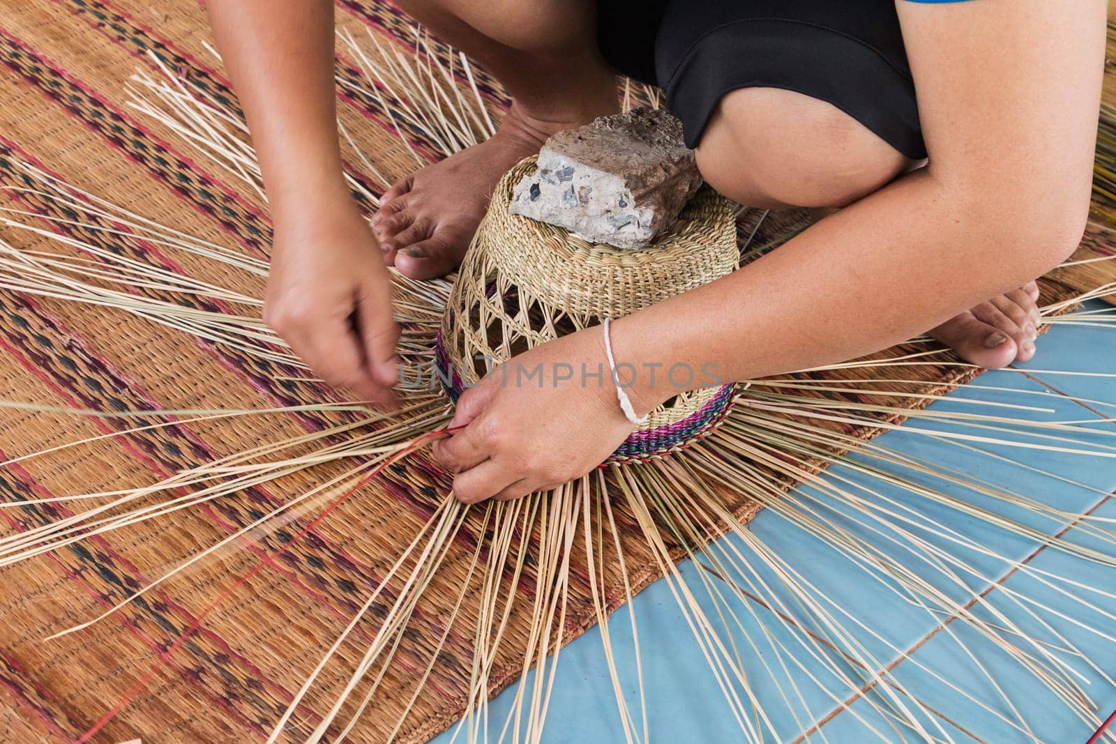 Manufacture straw hat,production by hand in Asia