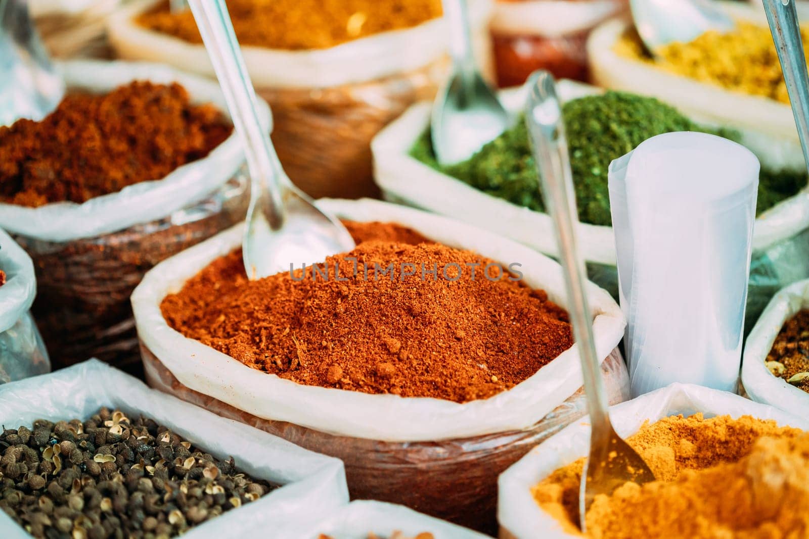 Close View Of Masala Curry, Bright Colors Fragrant Seasoning, Condiment In Bags On Local Food Market, Bazaar.