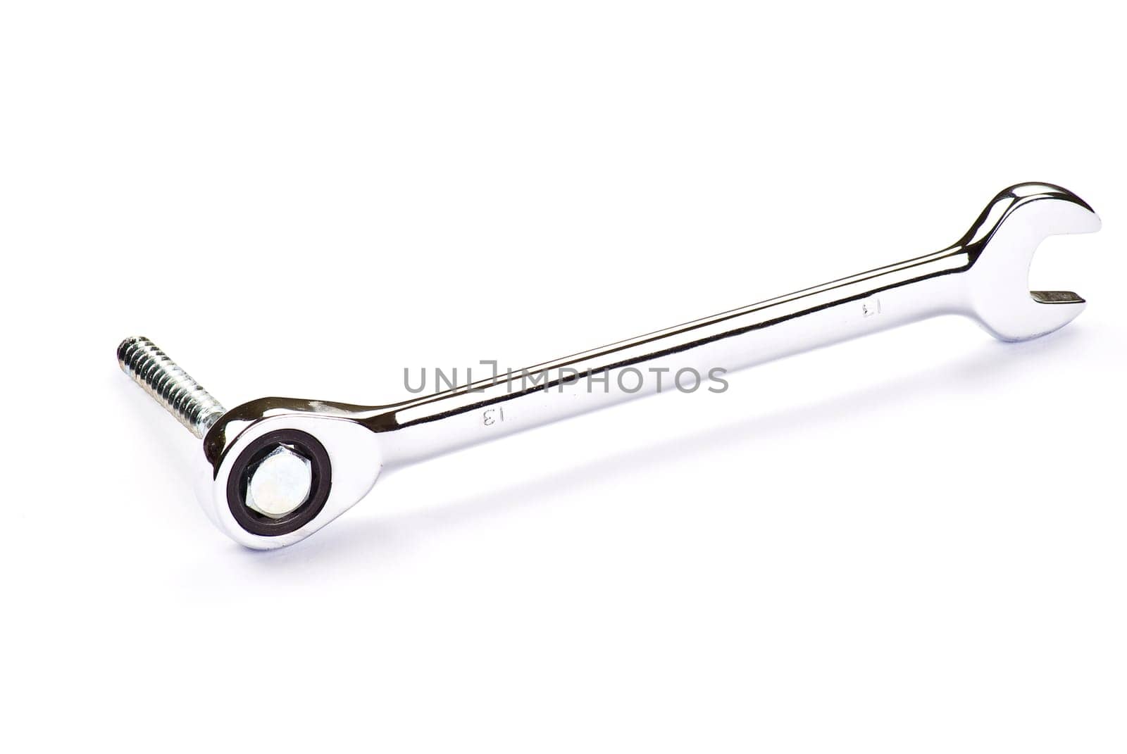 Stainless Steel Wrench and bolt over white background