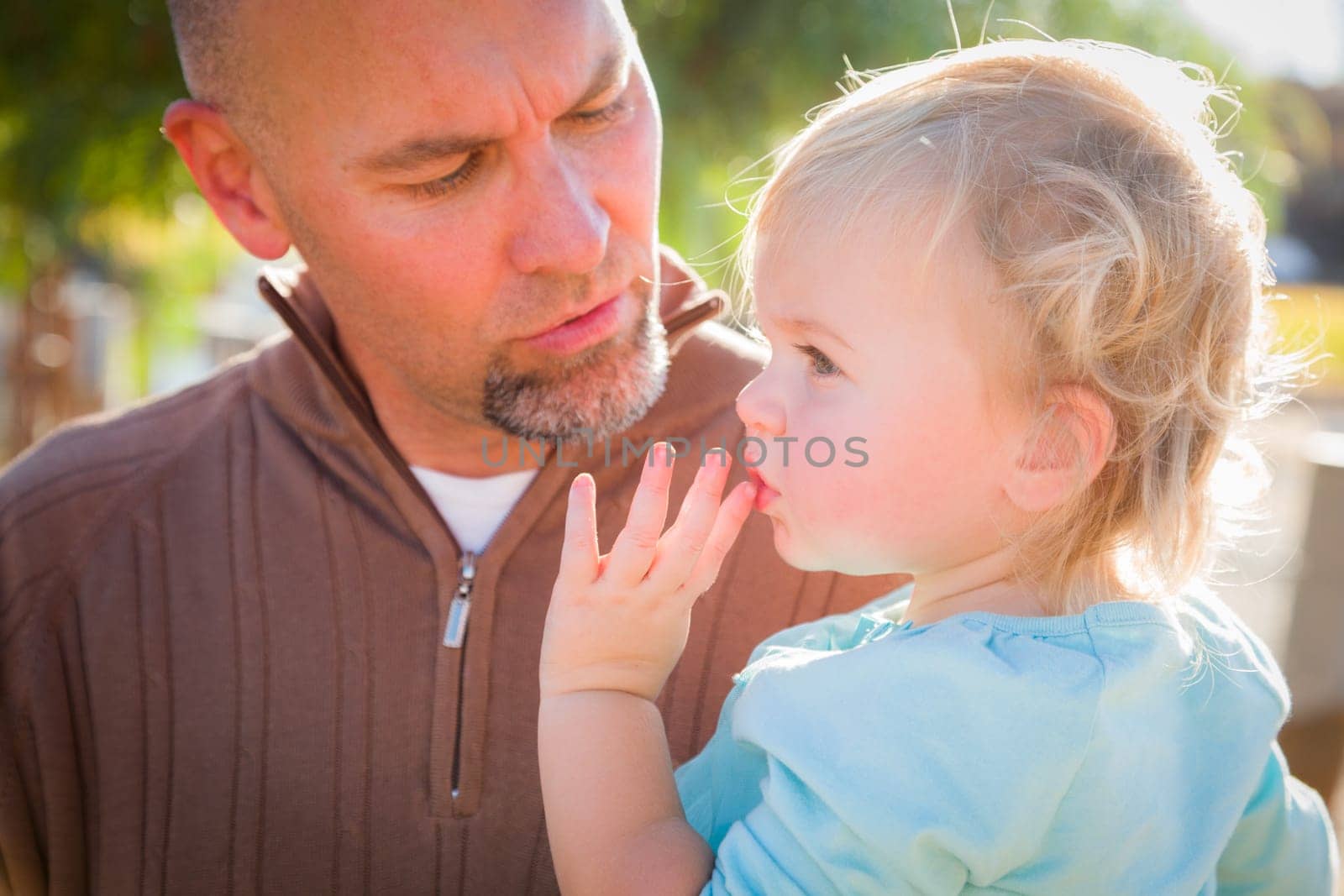 Adorable Young Family Enjoys a Day at the Pumpkin Patch.