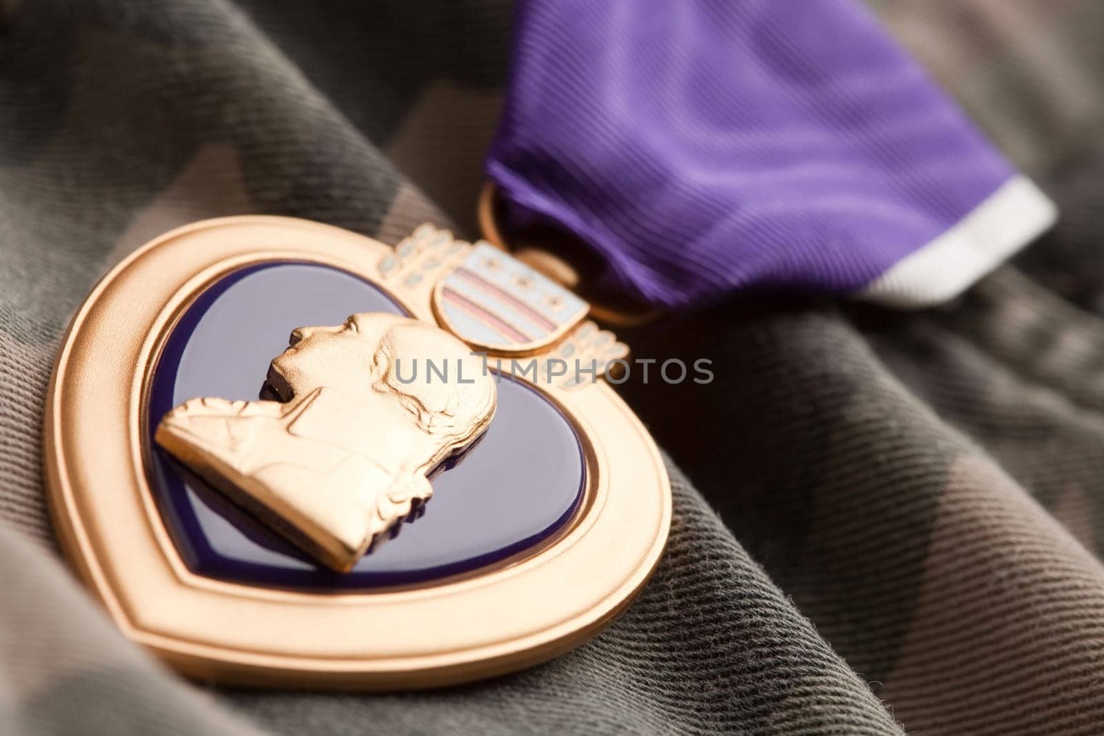 Purple Heart War Medal on Camouflage Material