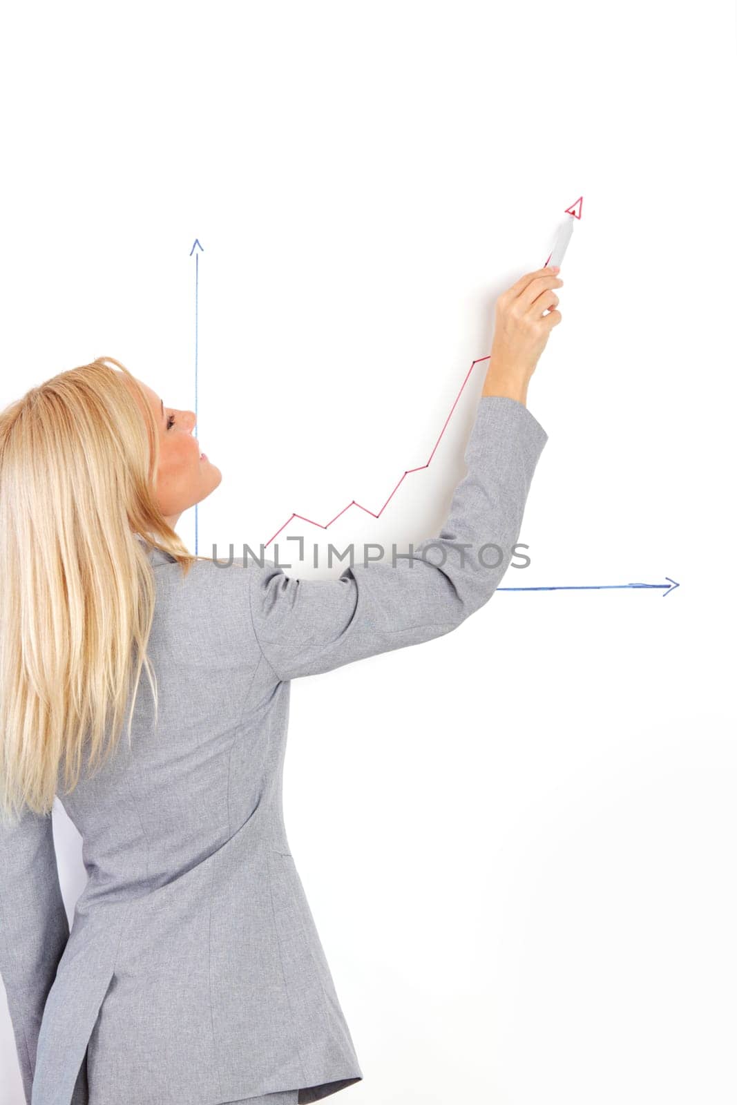 business woman draws a graph on the wall
