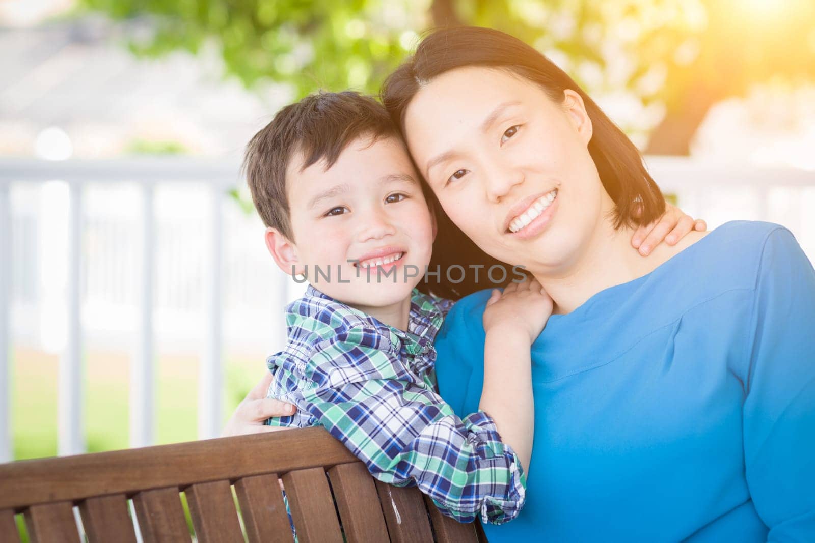 Outdoor Portrait of Chinese Mother with Her Mixed Race Chinese and Caucasian Young Boy