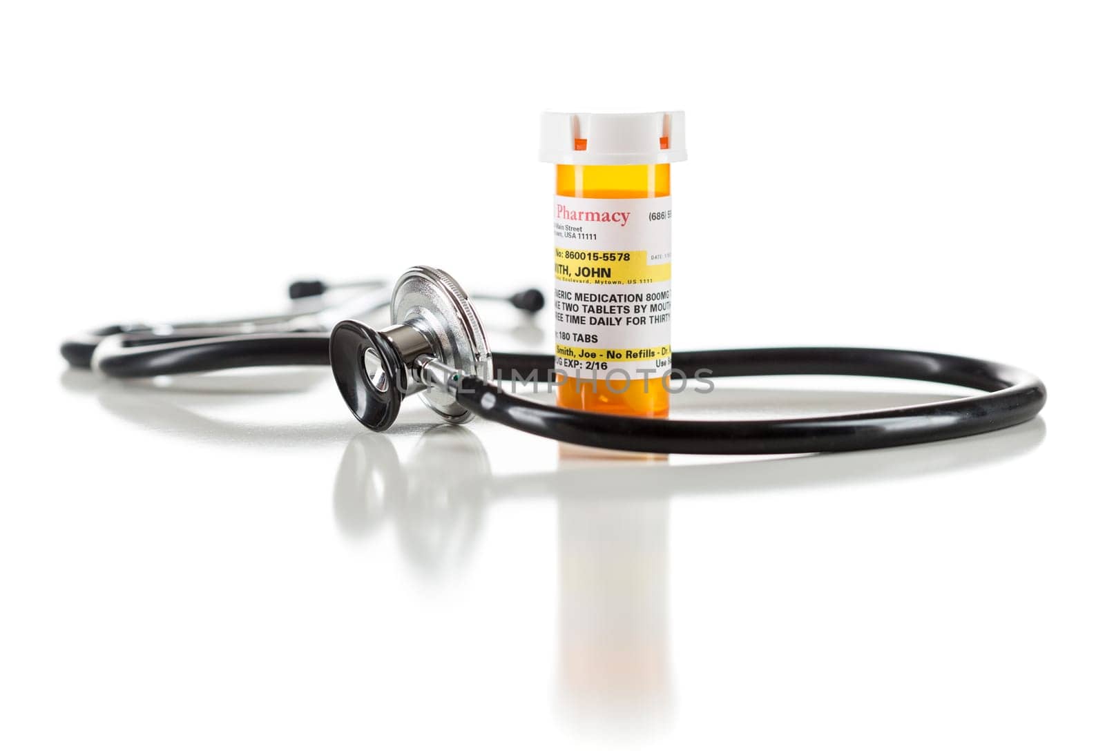One Non-Proprietary Medicine Prescription Bottle with Stethoscope Isolated on a White Background.