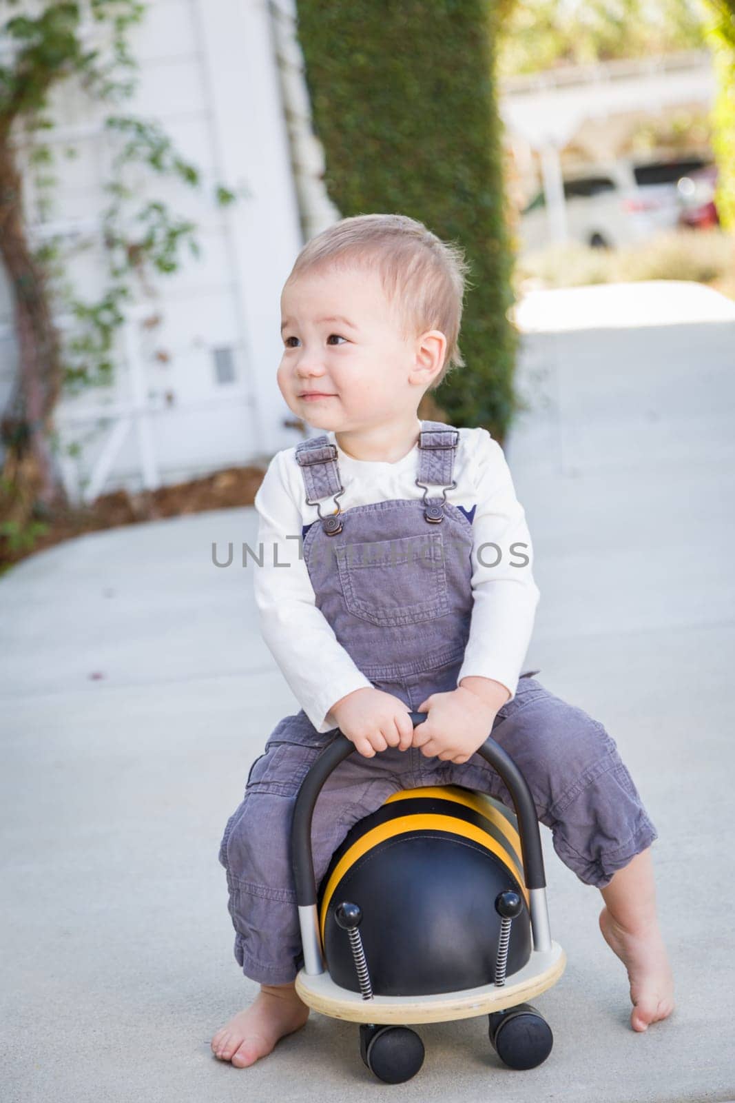 Young Mixed Race Chinese and Caucasian Baby Boy Having Fun Outdoors